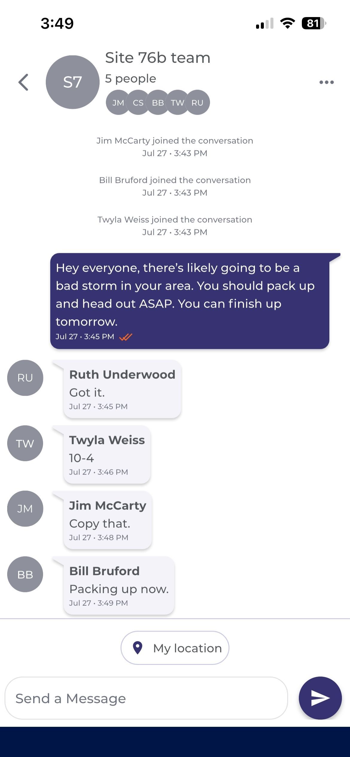 A group message thread with a whole team acknowledging a storm warning